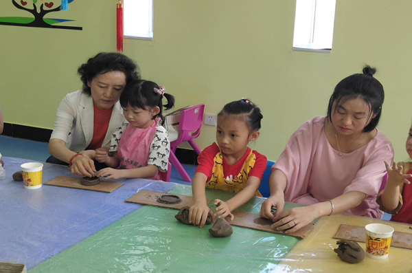 庆阳市博物馆举办暑期社教亲子活动“今年暑期去哪里,博物馆里来‘陶’宝”